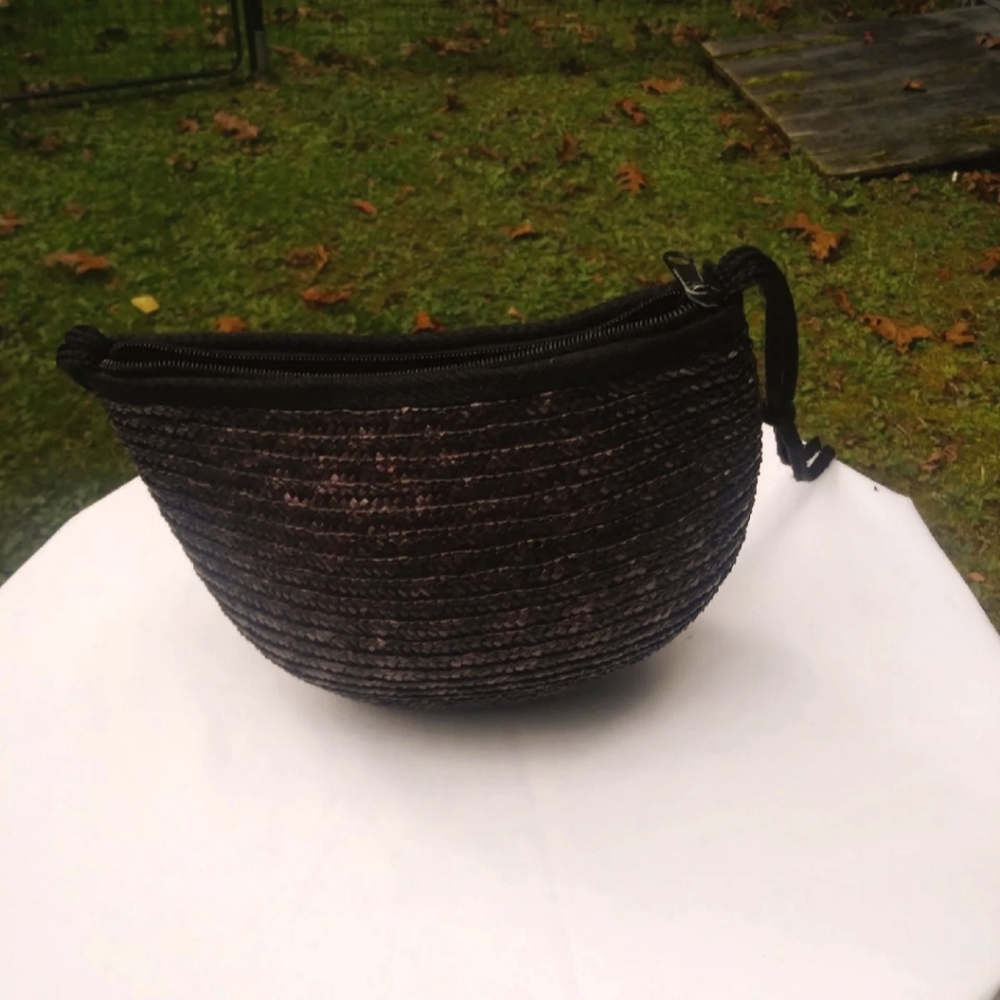 Women's black straw handbag